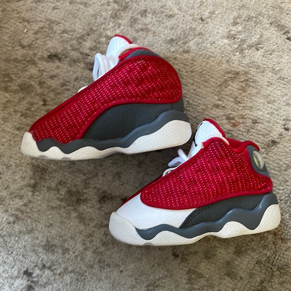 Little kids baby Jordan 13 retro red and white sneakers size 3C, like new.